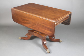 A Scotts William IV mahogany pedestal Pembroke table, fitted a frieze drawer and raised on a square column with triform base, splayed feet ending in paw caps and castors 28"h x 22"w x 43"l when fully extended 