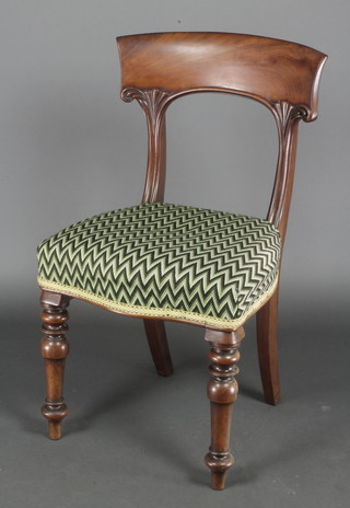 A William IV mahogany bar back dining chair, the seat of serpentine outline upholstered in Berlin woolwork, raised on turned supports 