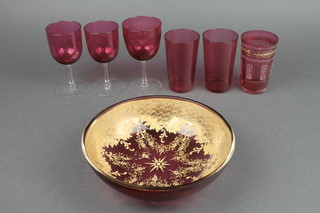 6 cranberry glasses and a gilt decorated bowl