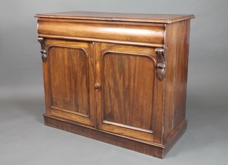 A Victorian mahogany chiffonier fitted a drawer above a cupboard enclosed by a pair of arched panelled doors, raised on a platform base 37"h x 44"w x 20 1/2"d 