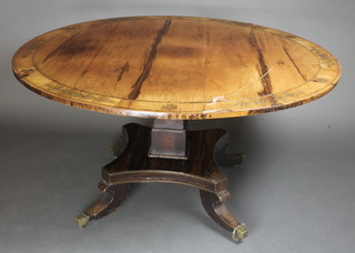 A Regency circular snap top brass inlaid rosewood breakfast table, raised on a square column with triform base and splayed feet 28"h x 53" diam. 