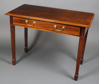 An Edwardian inlaid mahogany side table, fitted a drawer with brass swan neck drop handles, raised on square tapered supports ending in spade feet 27 1/2"h x 37 1/2"w x 19"d 
