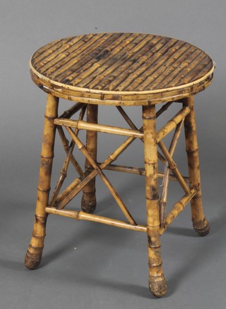 A 1920's circular bamboo stool 17"h x 14" diam. 