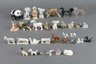 A collection of Wade Whimsies and minor china figures