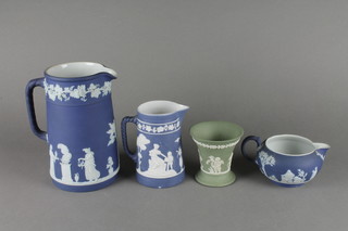 A Wedgwood Jasperware blue ground jug 7 1/2" and 3 other items of Jasperware