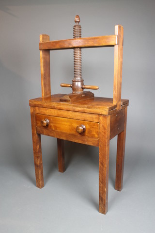 A Victorian rectangular mahogany book press fitted a drawer with tore handles, raised on square supports 52"h x 26"w x 14 1/2"d 