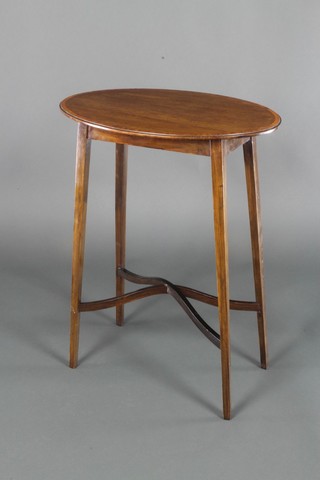 An Edwardian oval inlaid mahogany occasional table raised on square tapering supports with X framed stretcher 27 1/2"h x 21"w x 14 1/2"d 