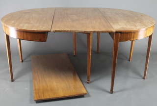 A Georgian mahogany D end dining table raised on 9 tapered supports, spade feet, 29"h x 48"w x 48" when closed x 94" when extended