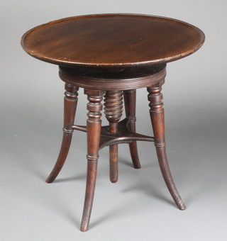 A circular adjustable revolving dish top wine table, formerly a piano stool raised on 4 turned columns with undertier 19"h x 20" diam. 