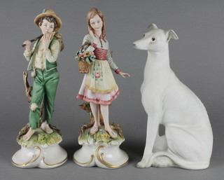 A bisque figure of a seated hound 9", 2 Continental figures of a girl and boy 