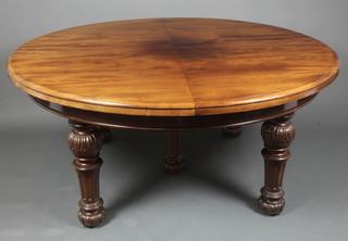 Hope & Collinson, a Victorian circular quartered extending dining table raised on 5 turned and fluted legs, bun feet, 29"h x 64"diam. when closed, x approx 228" when fully extended, the boss to the centre marked Jonson & James 67 Bond Street London 4876, all the leaves are missing 