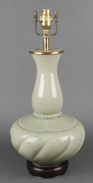 A 20th Century Celadon moulded baluster vase with waisted neck and moulded decoration converted to electricity 9" 