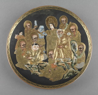 A late 19th Century Satsuma plate with a group of deities 7" 