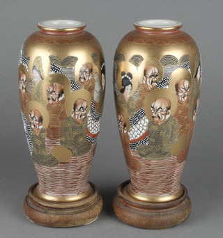A pair of early 20th Century Japanese oviform vases decorated with deities 7 1/2" 