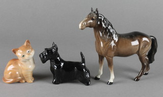 A Beswick figure of a standing horse 7", a seated kitten 3" and a West Highland Terrier 3 3/4" 
