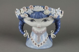 A stylish 1970s Lladro centrepiece in the form of a young girl with flowers in her hair 11" 