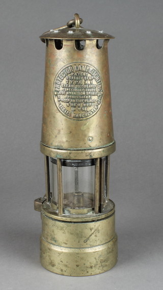 A miner's Davy lamp by the Protector Lamp and Lighting Company 