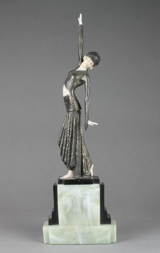 An Art Deco style spelter and plastic figure of a dancing lady, raised on a 2 colour marble base 16 1/2" 
