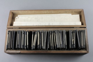 A collection of various coloured photograph slides mainly Henry W Gaunt & Co of Oxford, contained in a wooden box  