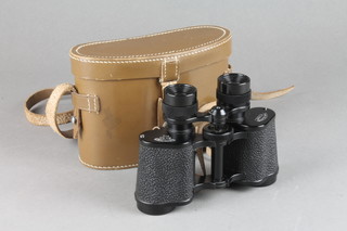 A pair of Spinder & Hoyer 8 x 30 field glasses complete with leather case 