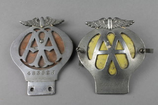 An AA beehive radiator badge no.48352J and 1 other beehive radiator badge 5C90671