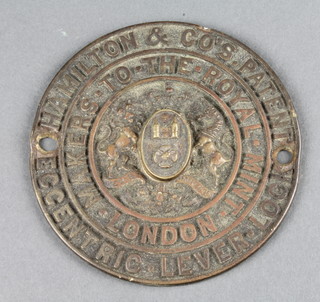 A Hamilton & Co. circular brass safe plate 4 1/2" 
