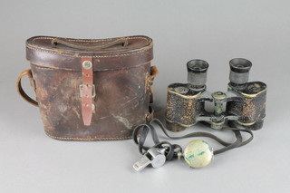A pair of WWI Bausch & Lomb Army Signal Corps issue binoculars marked Signal Corps US Army, serial no. EE96966 with leather case and complete with whistle and compass 