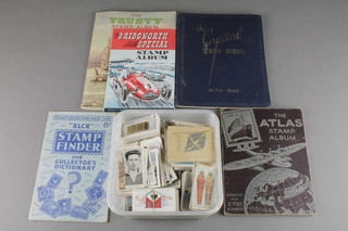 A Bridgnorth special stamp album, an XLCR stamp finder, a stamp atlas, a Capital stamp album and a Trusty stamp album together with a collection of cigarette cards and loose stamps