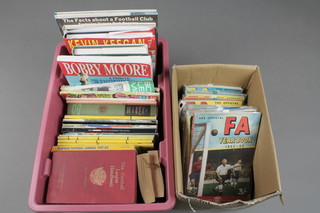 A cardboard box of various FA year books, 1950's and 60's together with 1 other box of various football related books