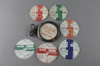 A Bulldog Improved Licence holder together with 6 tax discs all expiring 31 December 1928-1933 