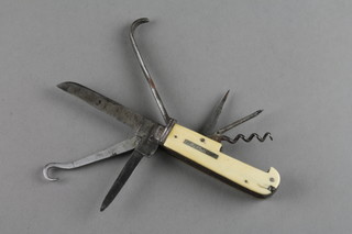 A 19th Century 40 bladed steel jack knife with bodkin, gimble, pair of tweezers, corkscrew and hook, button hook and 2 blades, 1 marked Fulletby 44 Bord