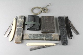 A gilt metal figure of a snake 5 1/2", a Victorian leather purse, 1 volume "A Few Hymns and Spiritual Songs 1856", a diamond steel cut throat razor, a Wiltshire Solingen cut throat razor and 1 other (f) 