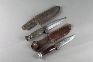 Ludgate Circus of London a Bowie knife with 6" blade and carved wooden grip together with W H Fargan & Sons a 1930's knife with 5" blade