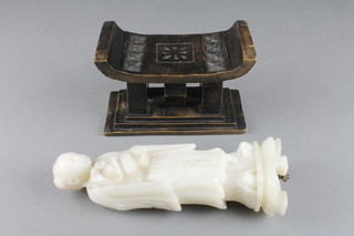 A Chinese soapstone figure of a standing sage 9" and a "chanty" carved miniature chieftains stool 4" 