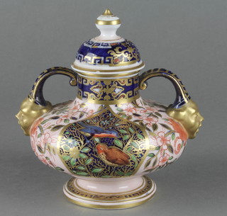 A 19th Century Royal Crown Derby squat oviform vase with mask handles and lid decorated with birds amongst flowers 5 1/2"