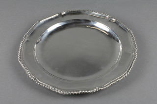 A George III silver plate with gadroon rim, engraved September 1782 20/14 no.2.21.5 London 1777, maker Jeremiah King, 624 grams