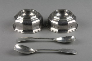 A pair of 18th Century silver panelled table salts of plain form with chased armorial and 2 Irish silver mustard spoons, 228 grams