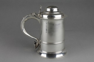 A George III silver tankard with pierced thumb piece and S scroll handle, London 1773, 710 grams
