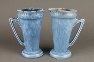 A pair of Art Deco blue glazed jugs 9" 