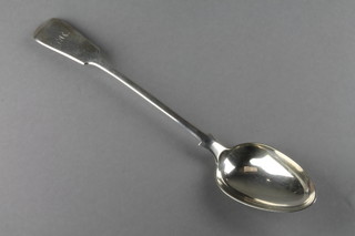A mid Victorian silver Old English pattern gravy spoon, Exeter 1866