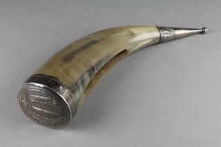 A white metal mounted Northern European horn