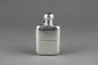 A silver hip flask with cup base 4" 122 grams