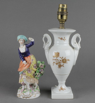 An early 20th Century Italian figure of a shepherdess 7 1/4", a Limoges table lamp 8" 