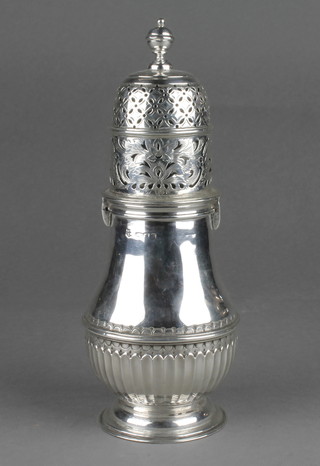 A Victorian repousse silver shaker with pierced and engraved decoration and bayonet fitting with rubbed marks, Chester 1898? 262 grams