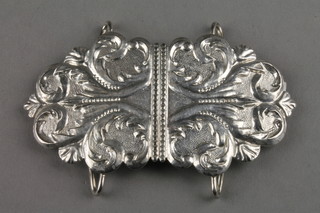A cast repousse silver buckle with scroll decoration 60 grams