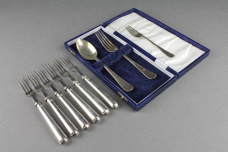 6 silver handled forks, a silver spoon and minor cutlery