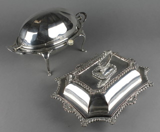 An Edwardian silver plated breakfast server on cabriole legs, a ditto Sheffield plate entree set