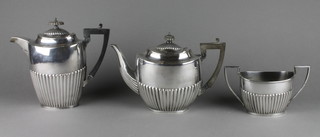 A Walker & Hall silver plated demi-fluted 3 piece tea set 
