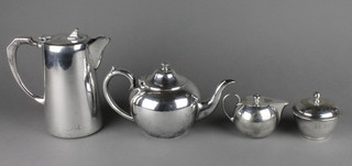 A silver plated 3 piece tea set and a coffee pot