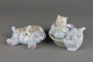 2 Nao figures, a kitten in a basket 5" and a sleeping puppy 5", boxed